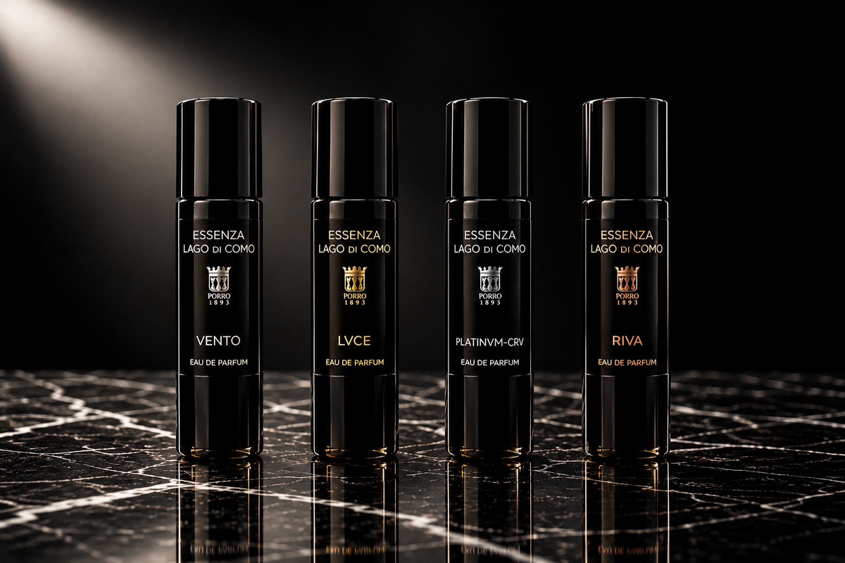 Quattro profumi da 15 ml Essenza Lago di Como su marmo nero, fragranze di nicchia per il fragrance layering e la creazione di una firma olfattiva personale.